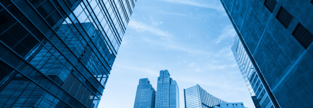 Looking Up Blue Modern Office Building