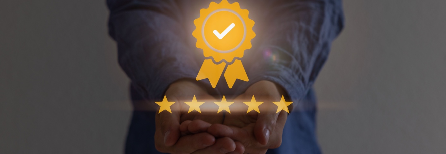 Hand shows the sign of the top service Quality assurance, Guarantee, Standards, ISO certification and standardization concept, satisfaction, service experience.
