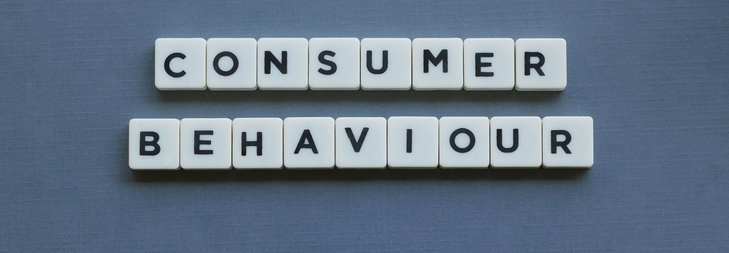 ' Consumer Behaviour ' word made of square letter word on grey background.